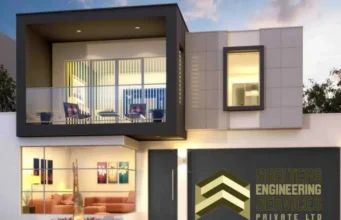 Why Strong Foundations Matter in Home Construction Modern residential building with a grey and white facade, featuring a prominent balcony on the upper level and large windows. The ground floor has a brightly lit interior with a red sofa and artwork. A company logo for "SHELTRES ENGINEERING SERVICES PRIVATE LTD" is visible on the exterior wall.